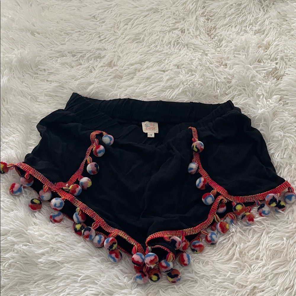 Surf Gypsy black gauze shorts with multicolor pom pom accents. Size s.